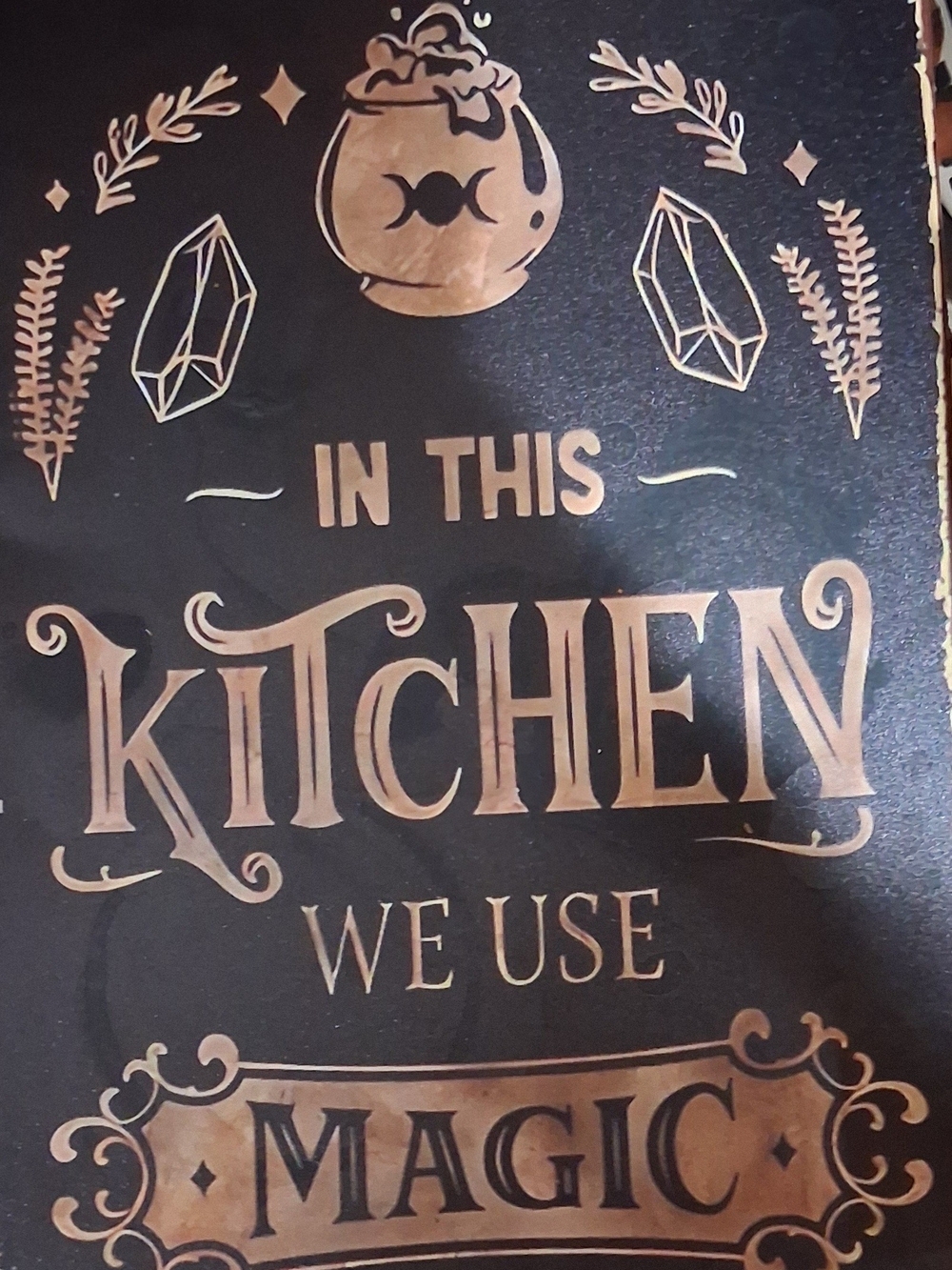 Kitchen Wall Sign - Black and Copper "In This Kitchen We Use Magic"